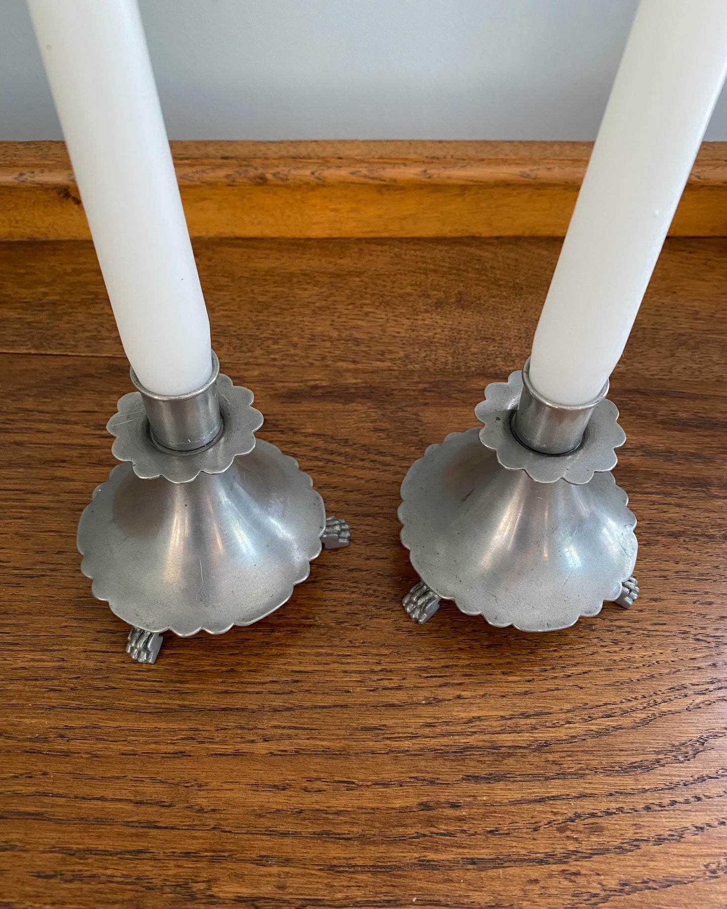 Pair of pewter candle holders