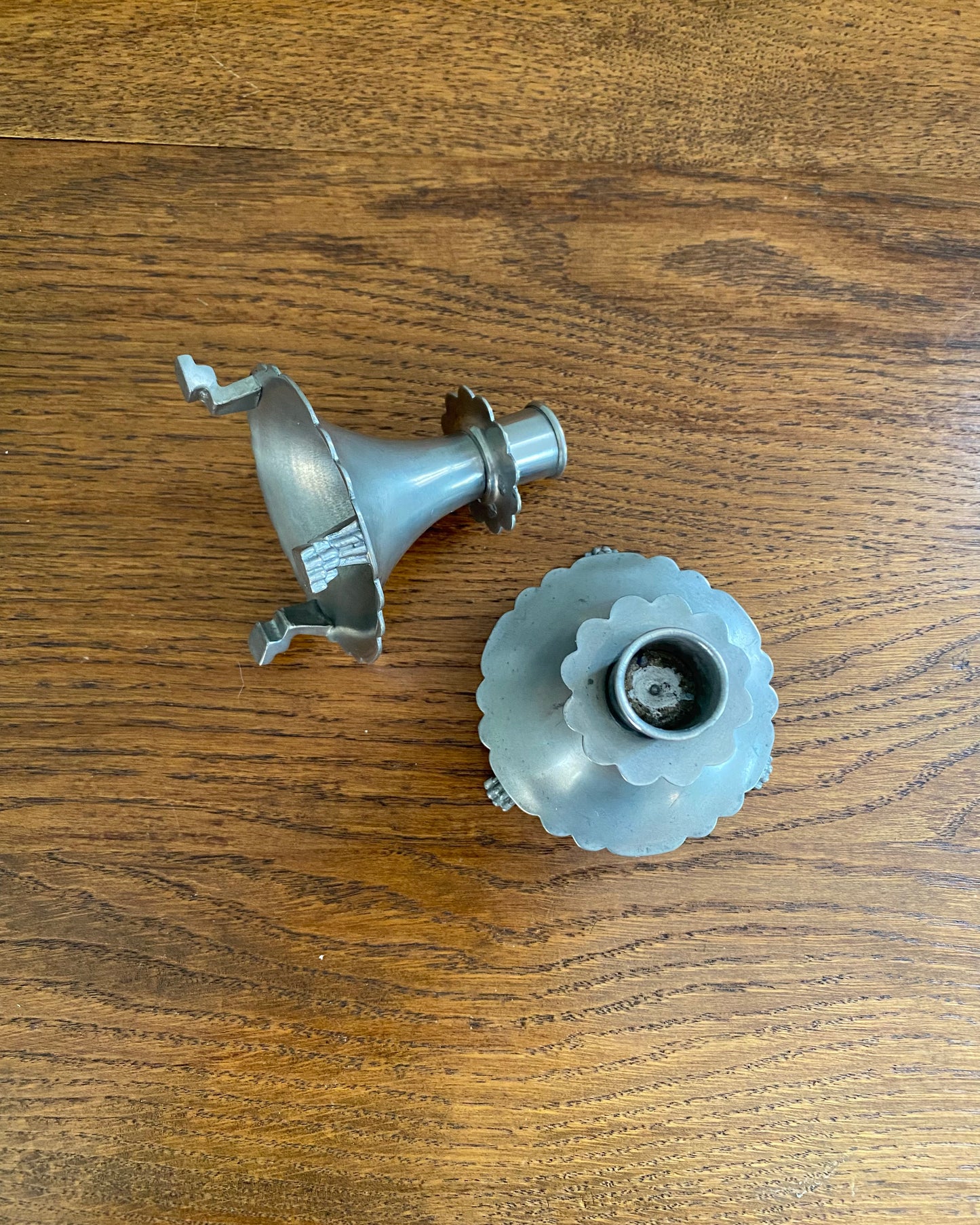 Pair of pewter candle holders