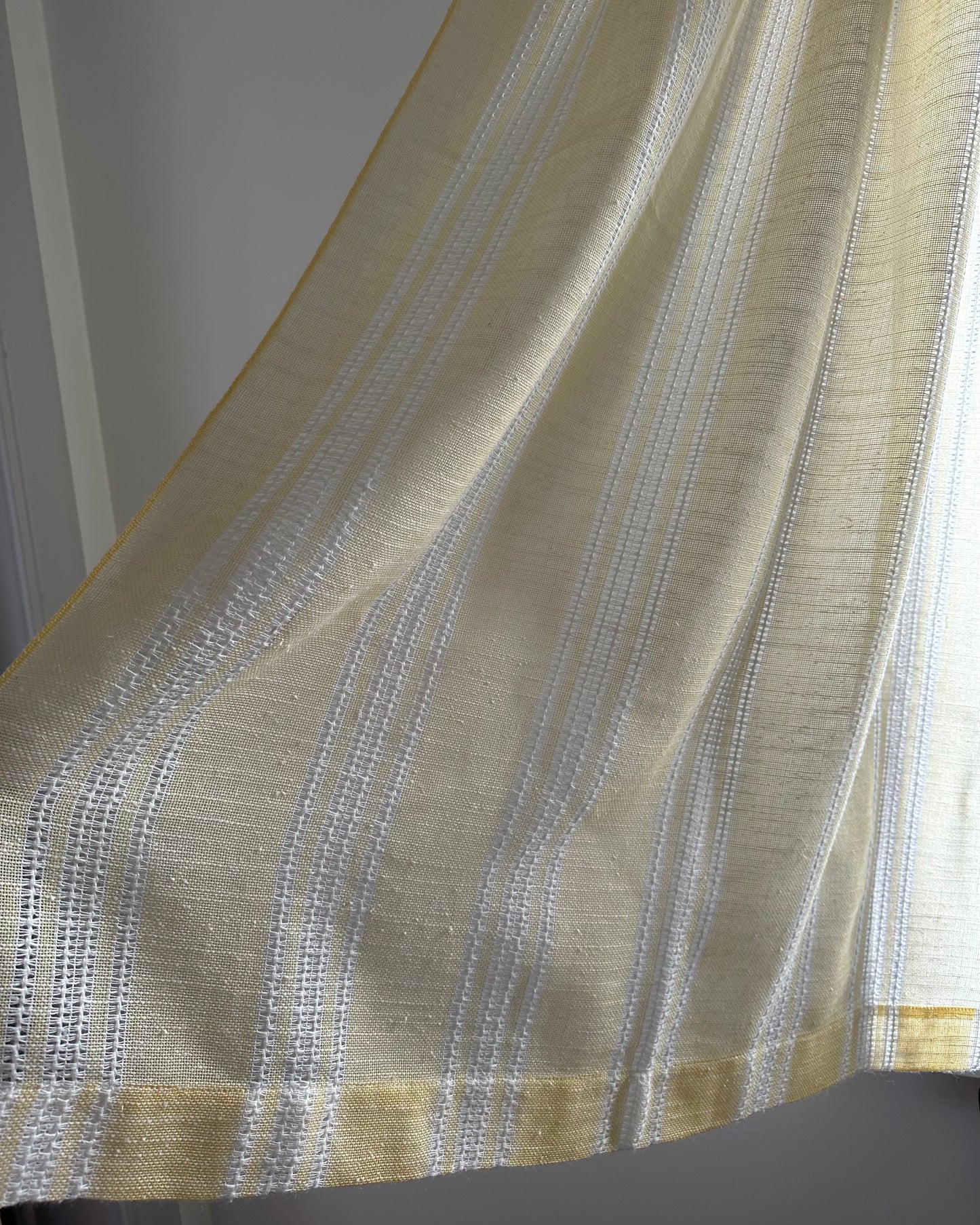 Pair of White and Yellow Curtains