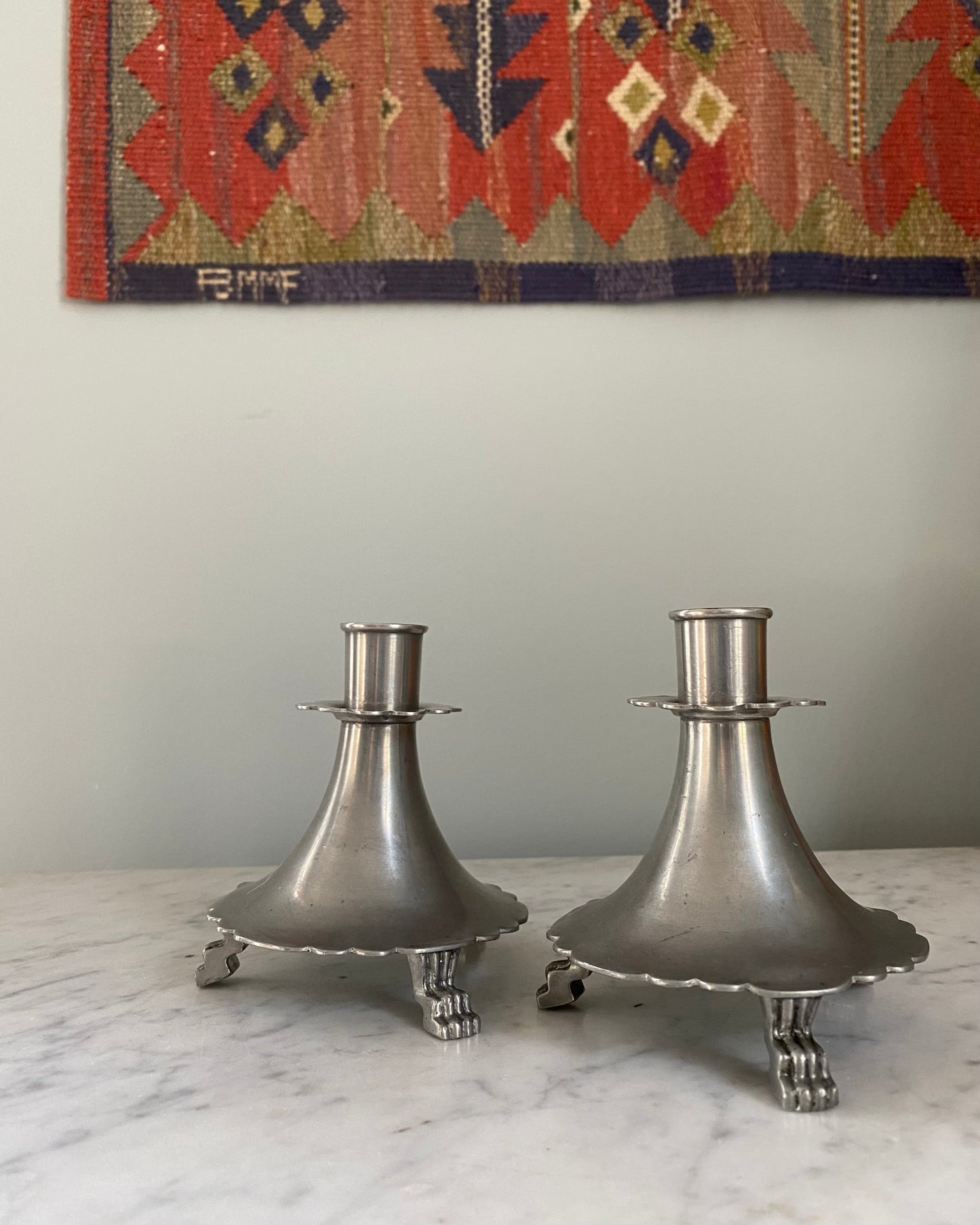 Pair of pewter candle holders