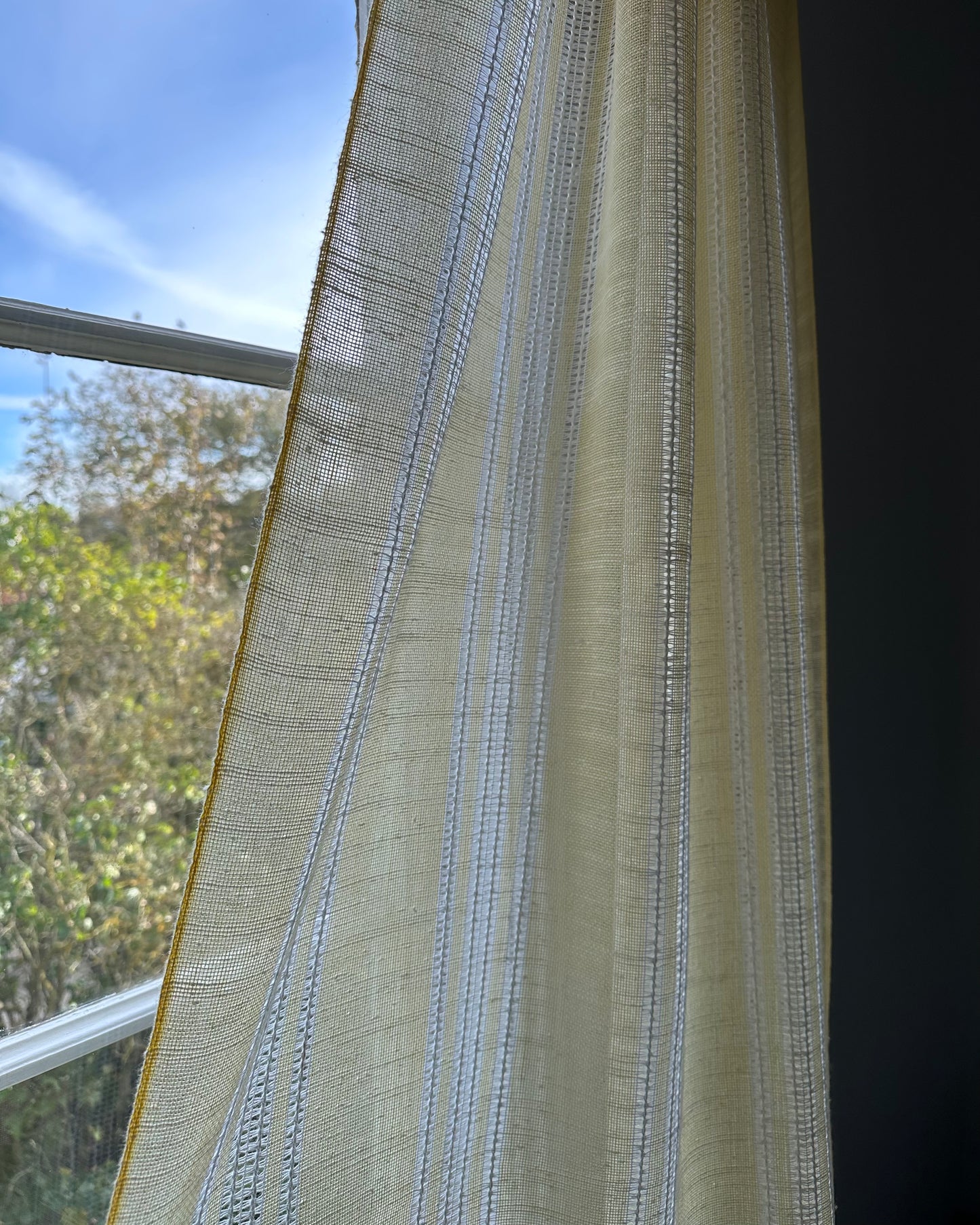 Pair of White and Yellow Curtains