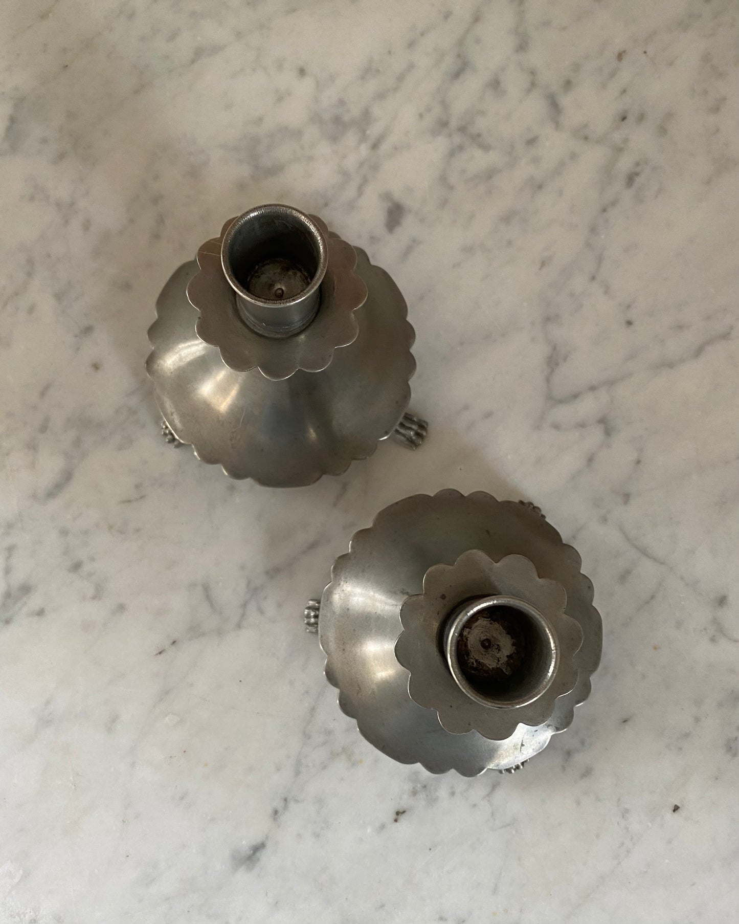 Pair of pewter candle holders