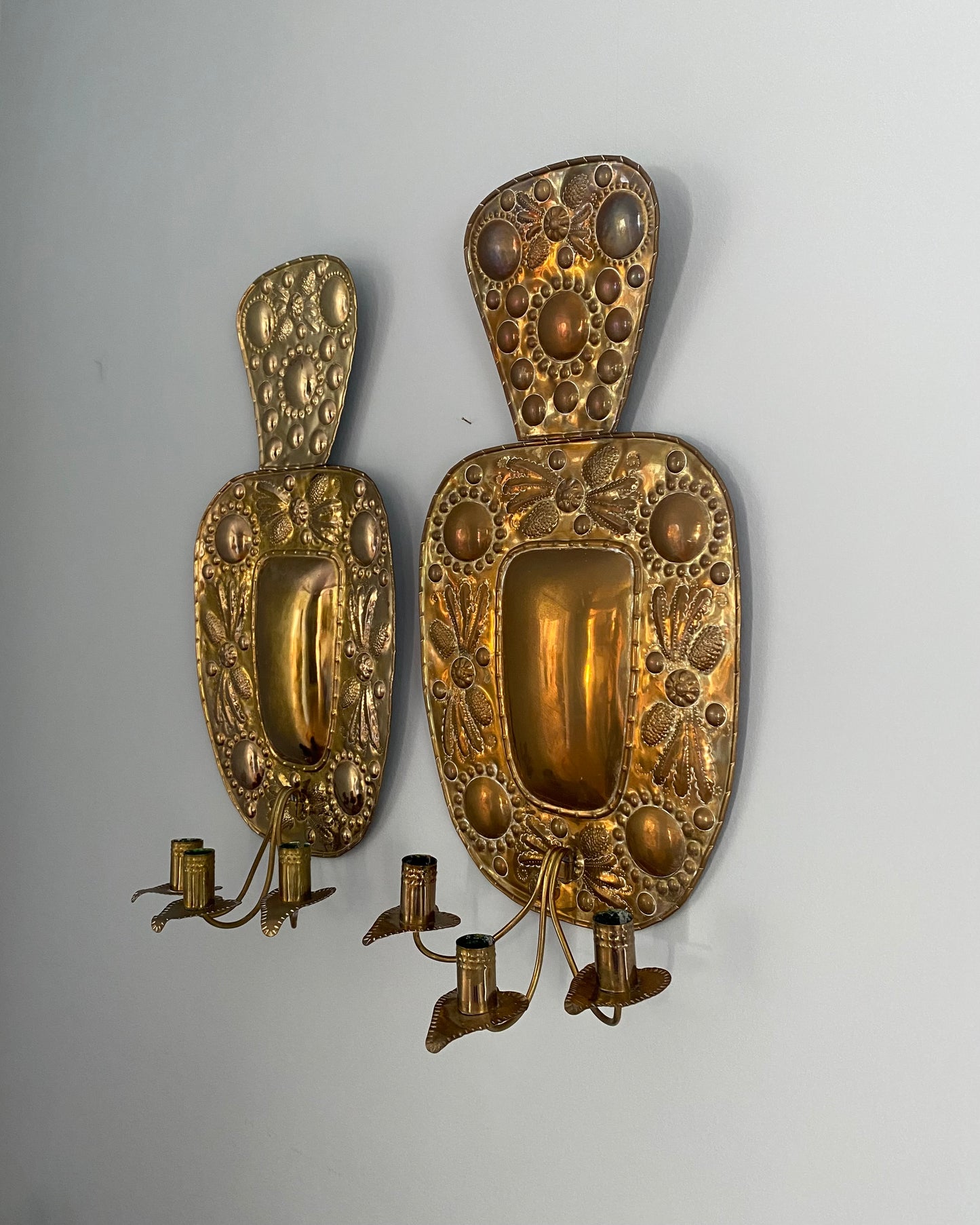 Pair of three - armed brass wall sconces