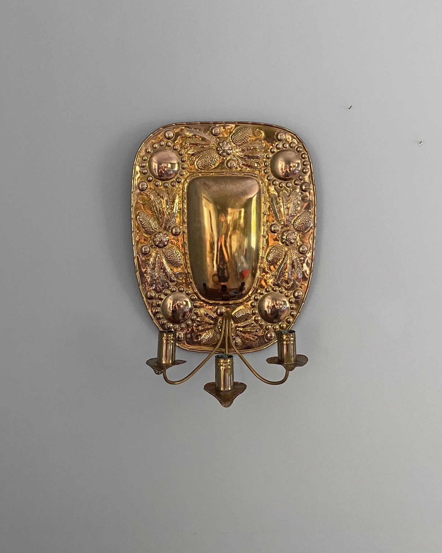 Pair of three - armed brass wall sconces