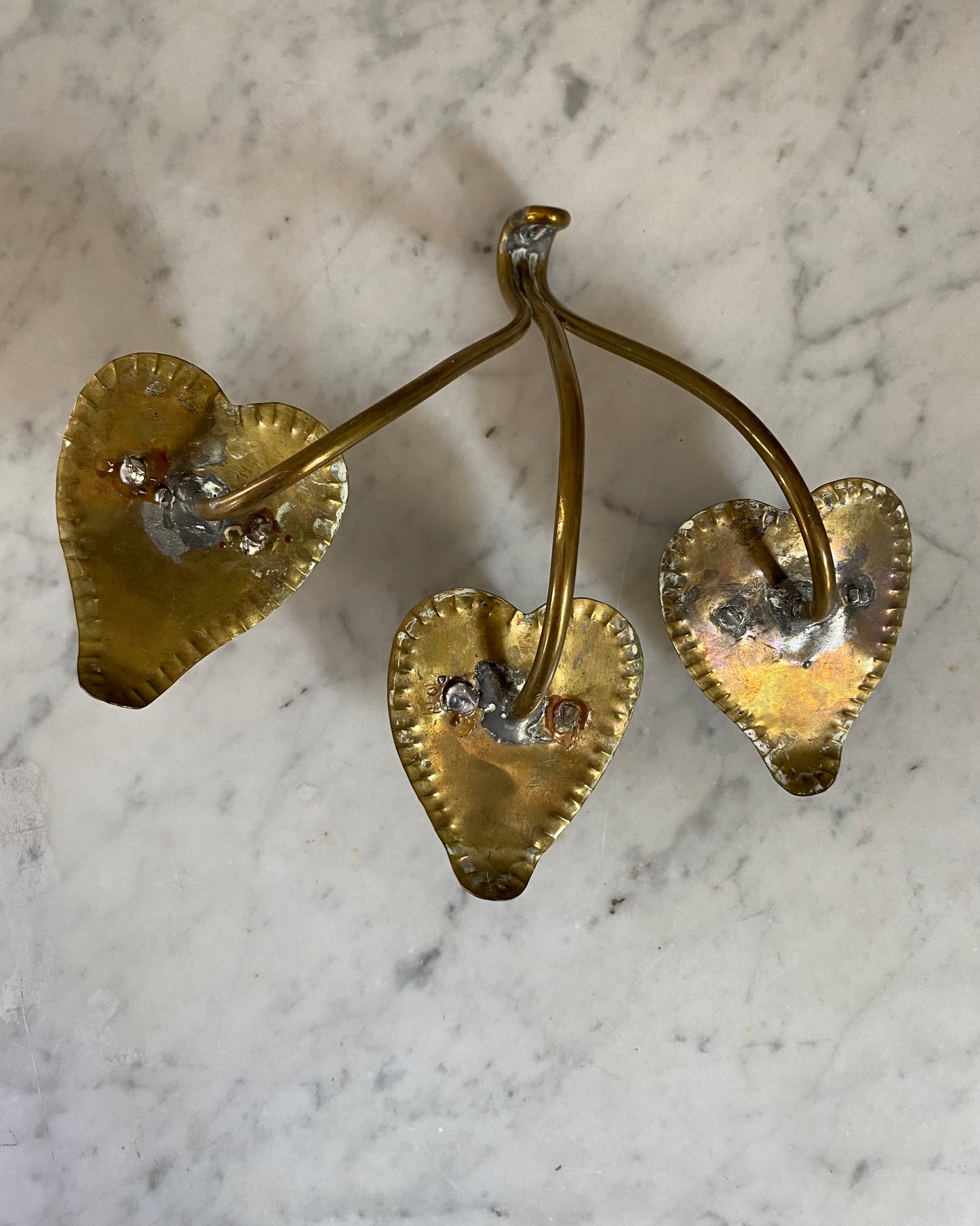 Pair of three - armed brass wall sconces