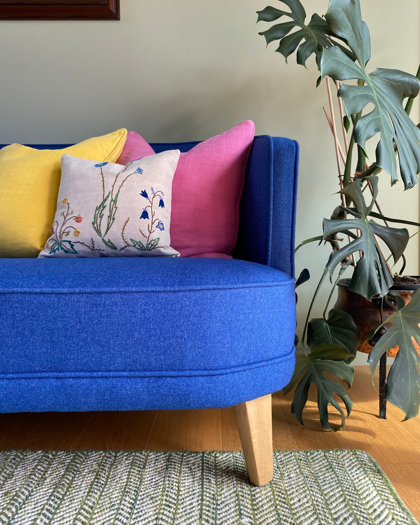 Two hand embroidered cushions