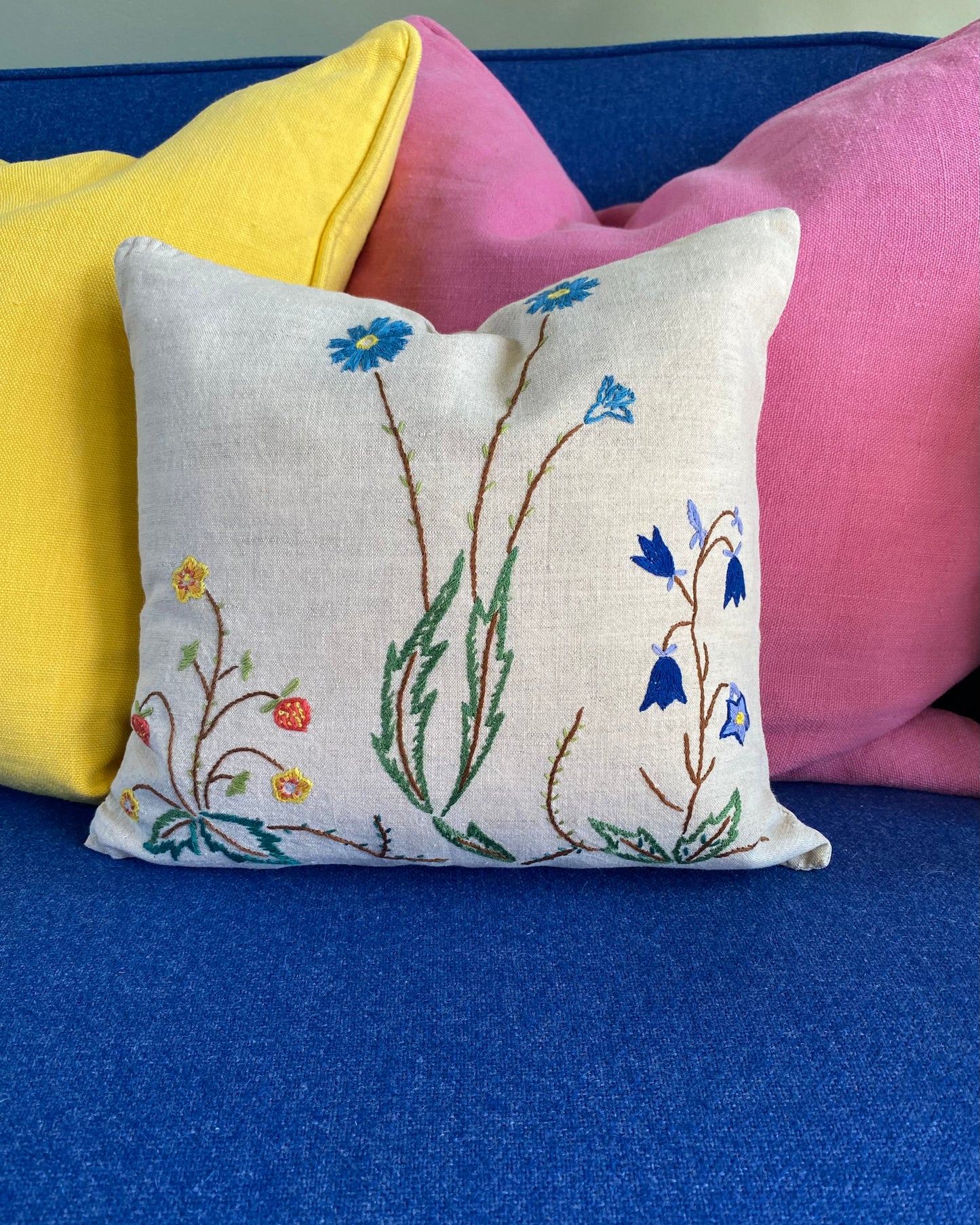 Two hand embroidered cushions
