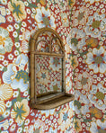 Load image into Gallery viewer, Vintage mirror with rattan shelf