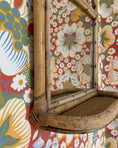 Load image into Gallery viewer, Vintage mirror with rattan shelf