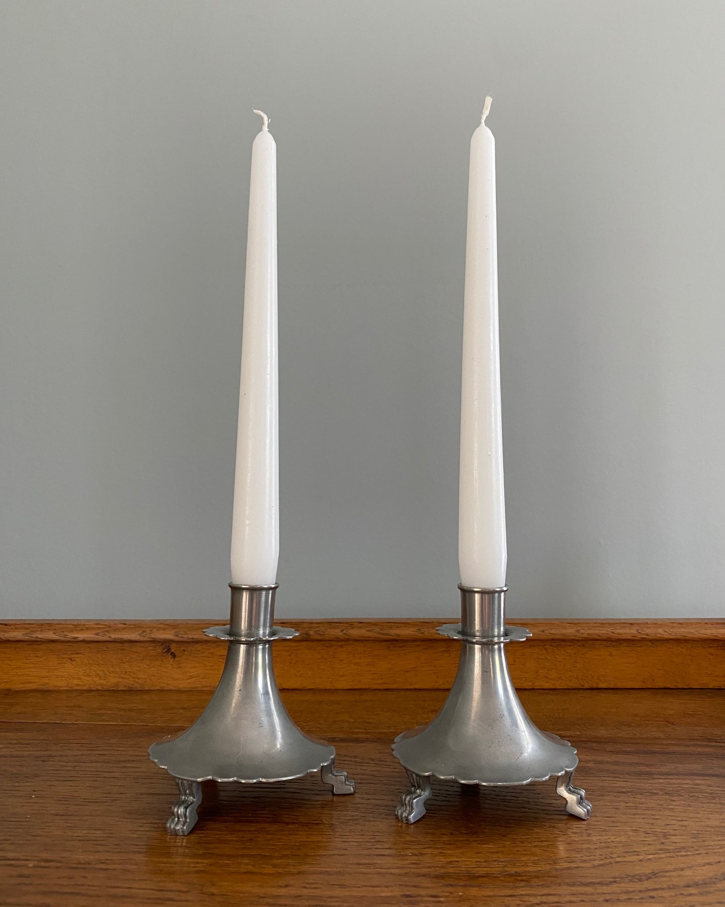 Pair of pewter candle holders