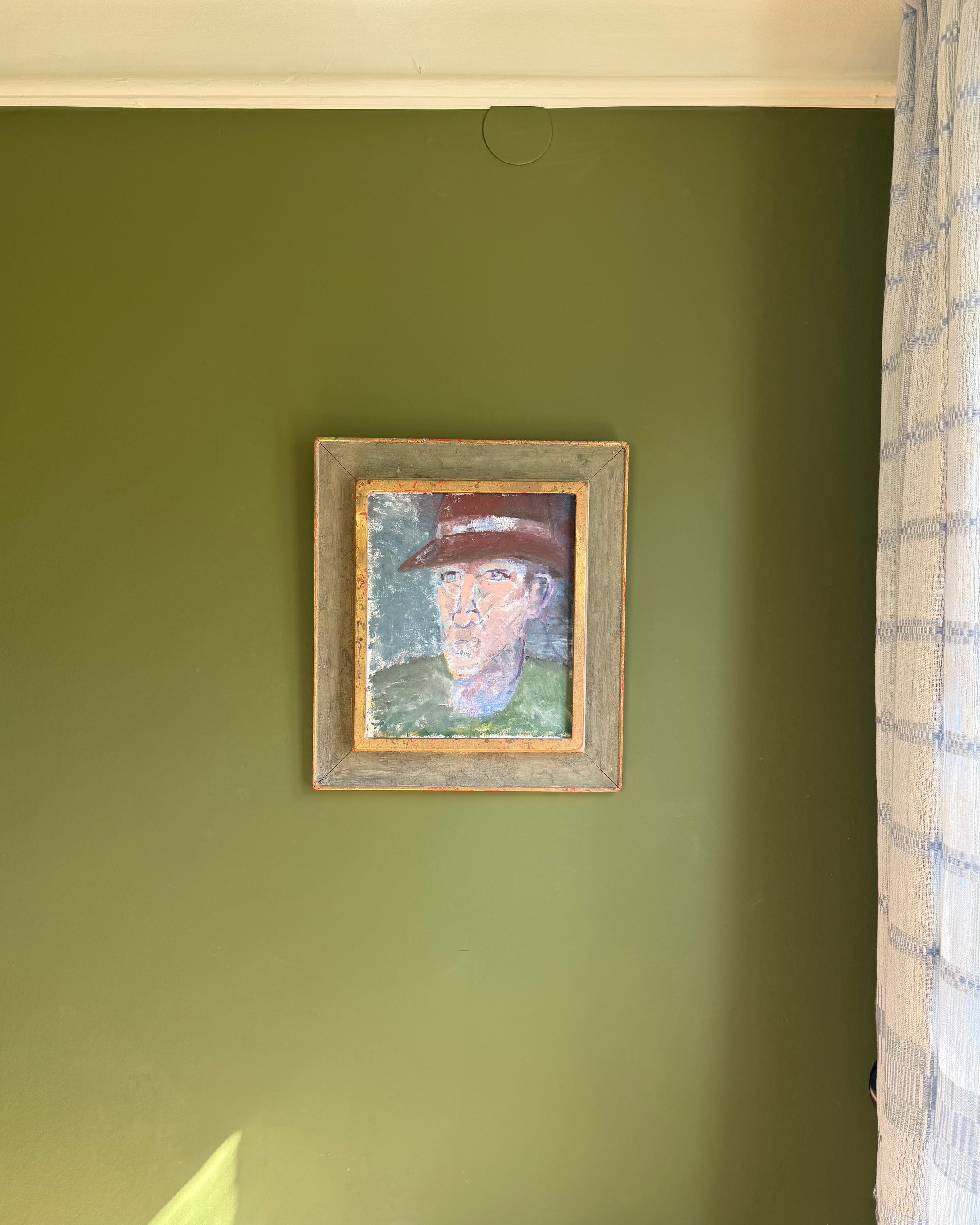 Man in Burgundy Hat