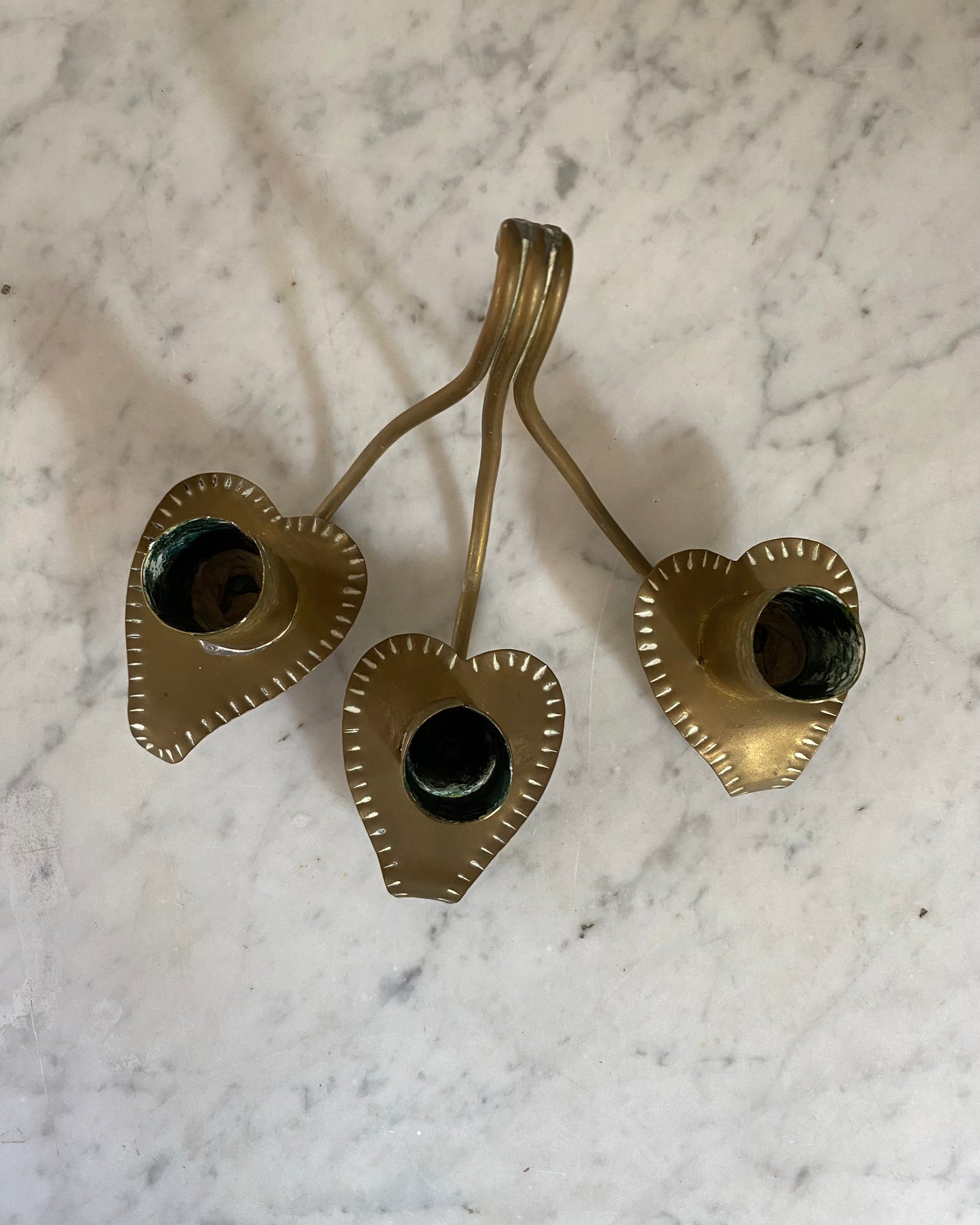 Pair of three - armed brass wall sconces