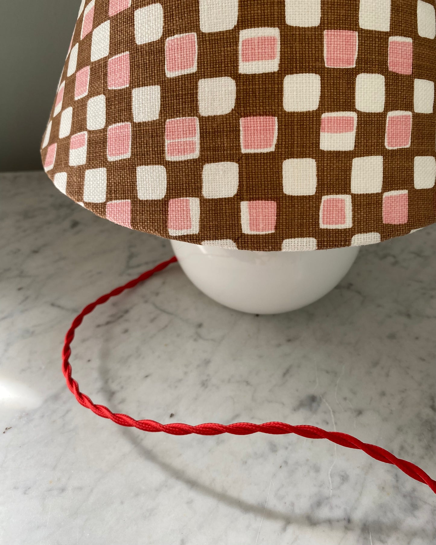 White table lamp with shade from Cathy Nordström