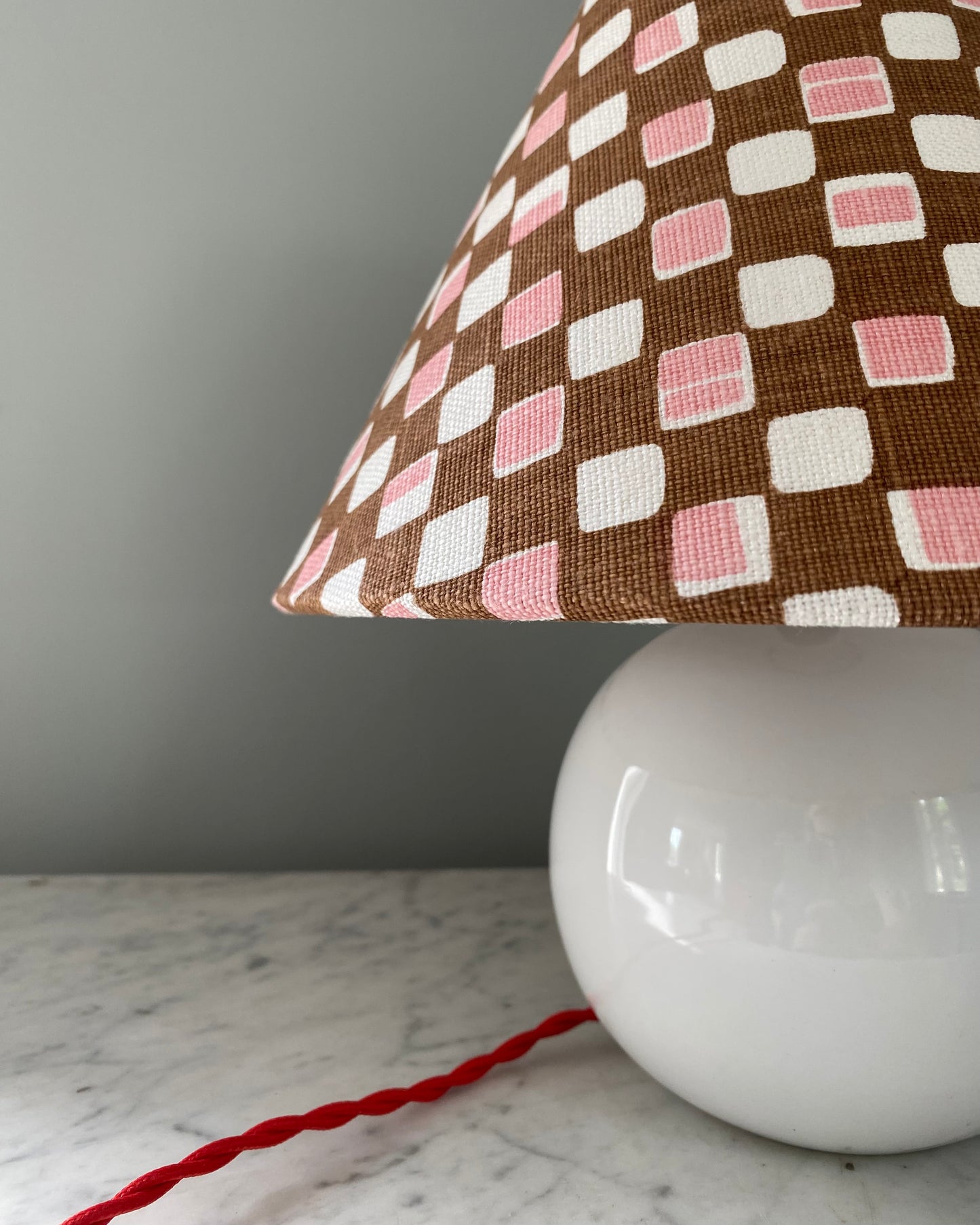 White table lamp with shade from Cathy Nordström