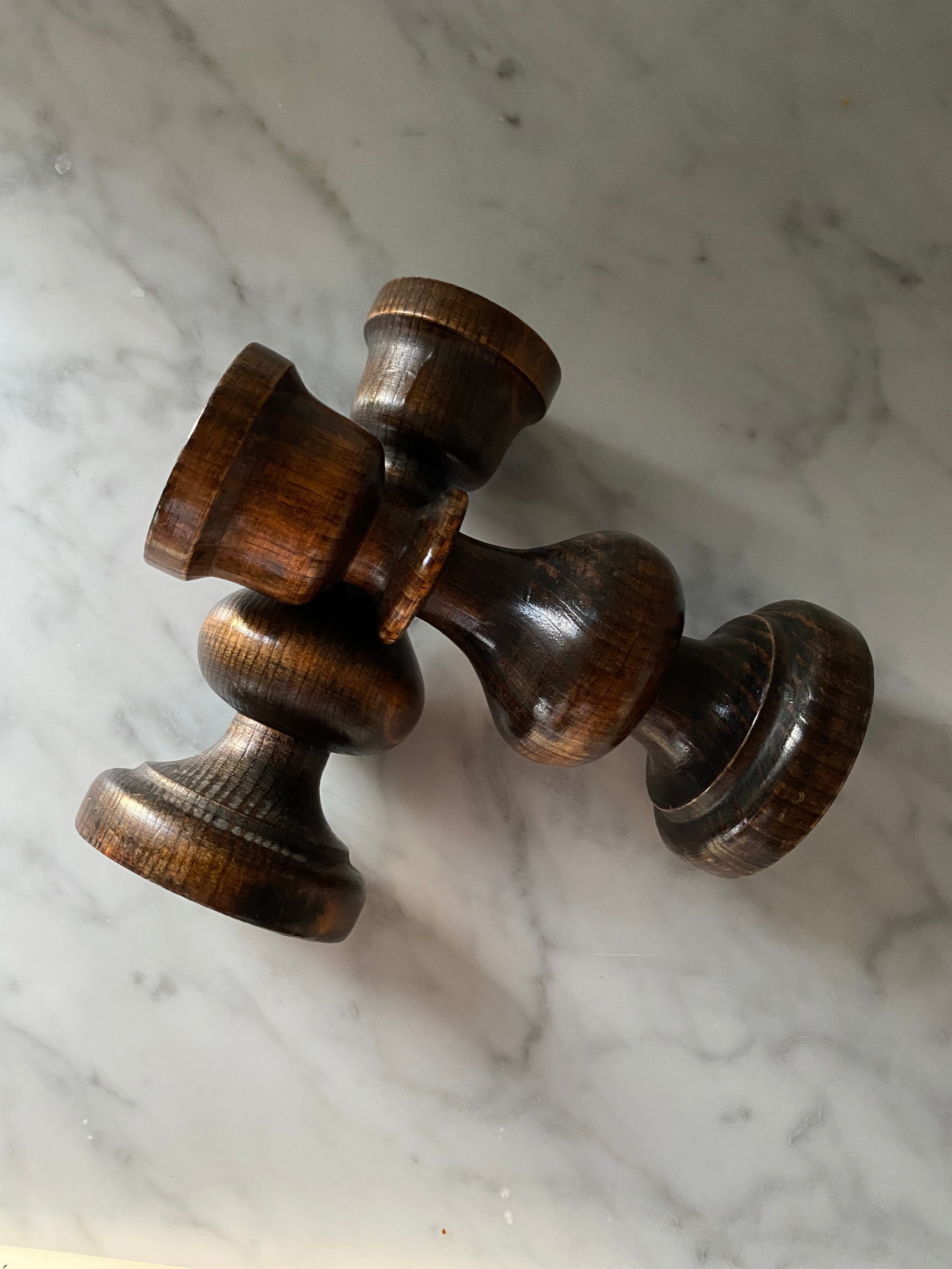 Pair of wooden candle holders