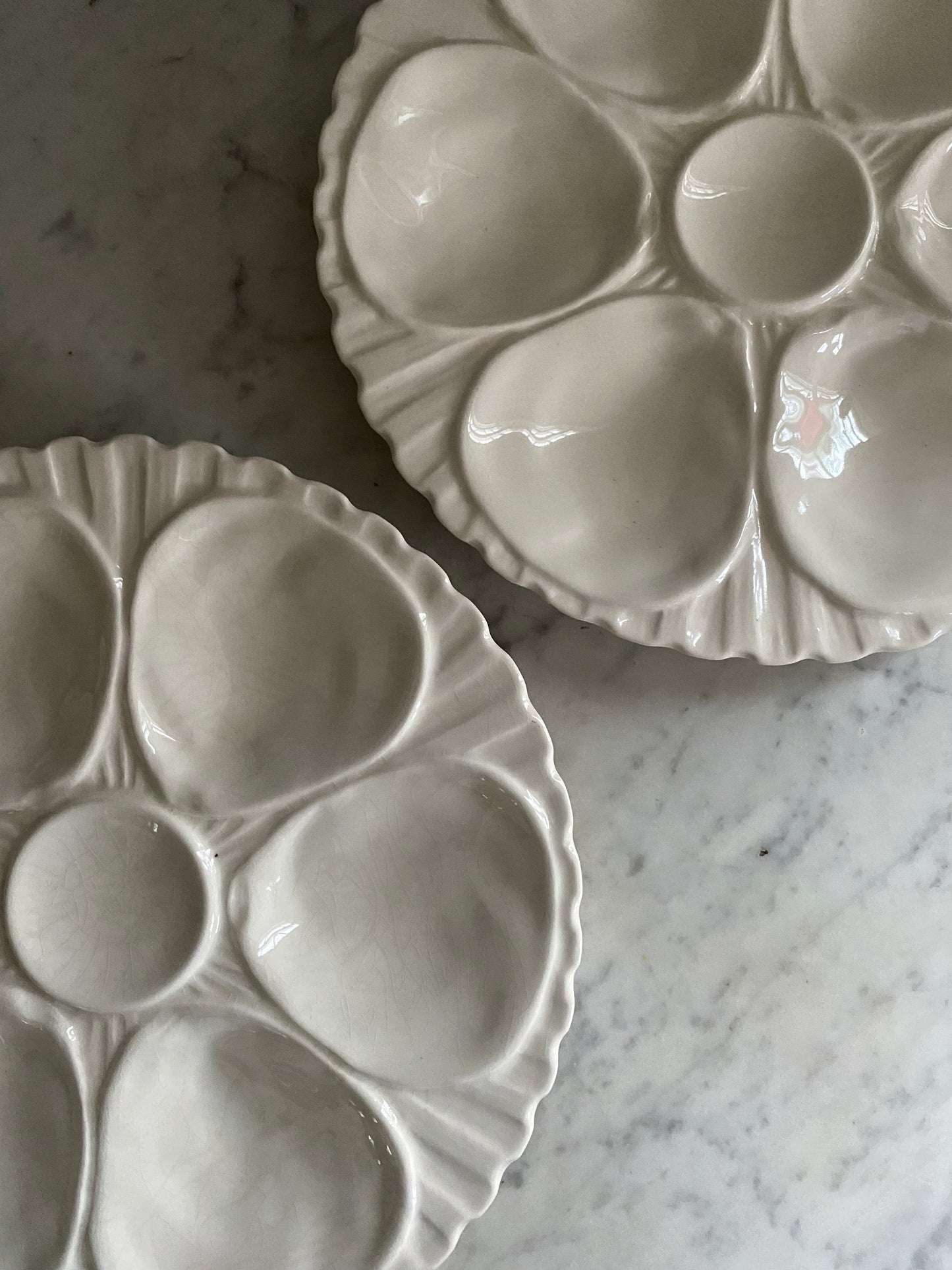 Two vintage oyster platters