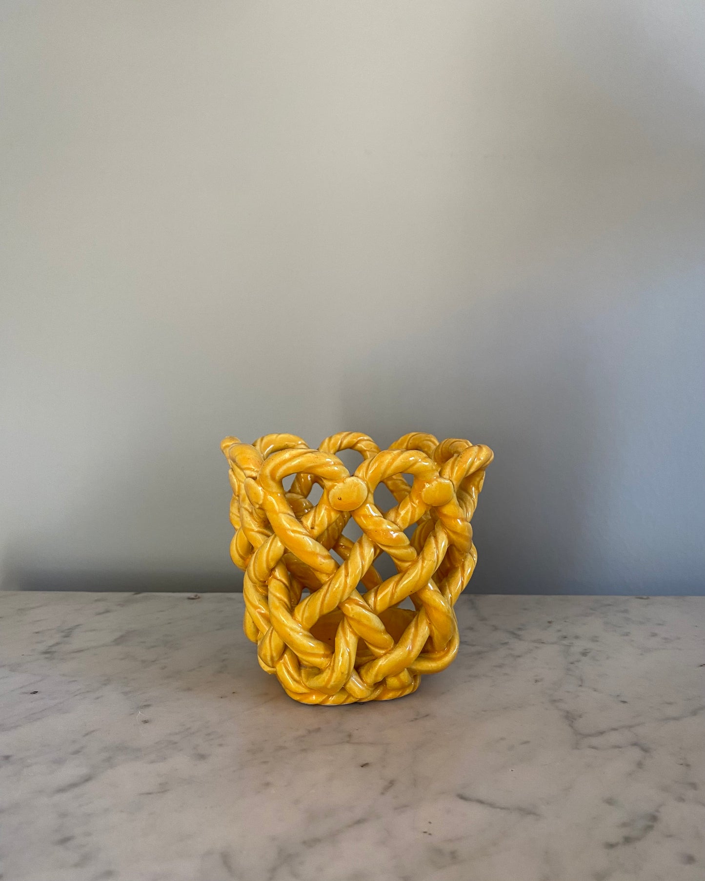 Mustard coloured woven basket