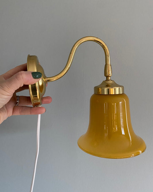 Vintage wall light with glass shade