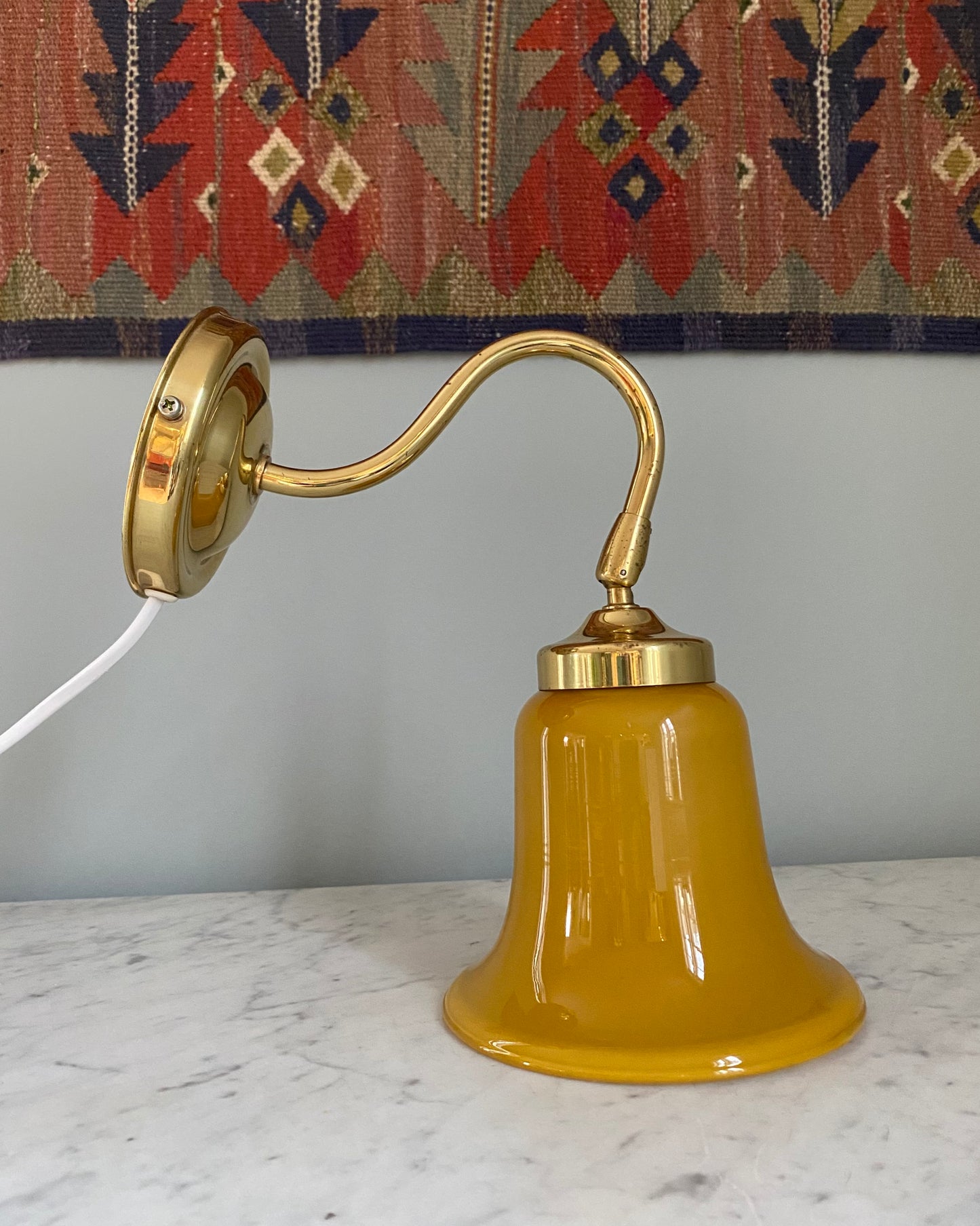 Vintage wall light with glass shade