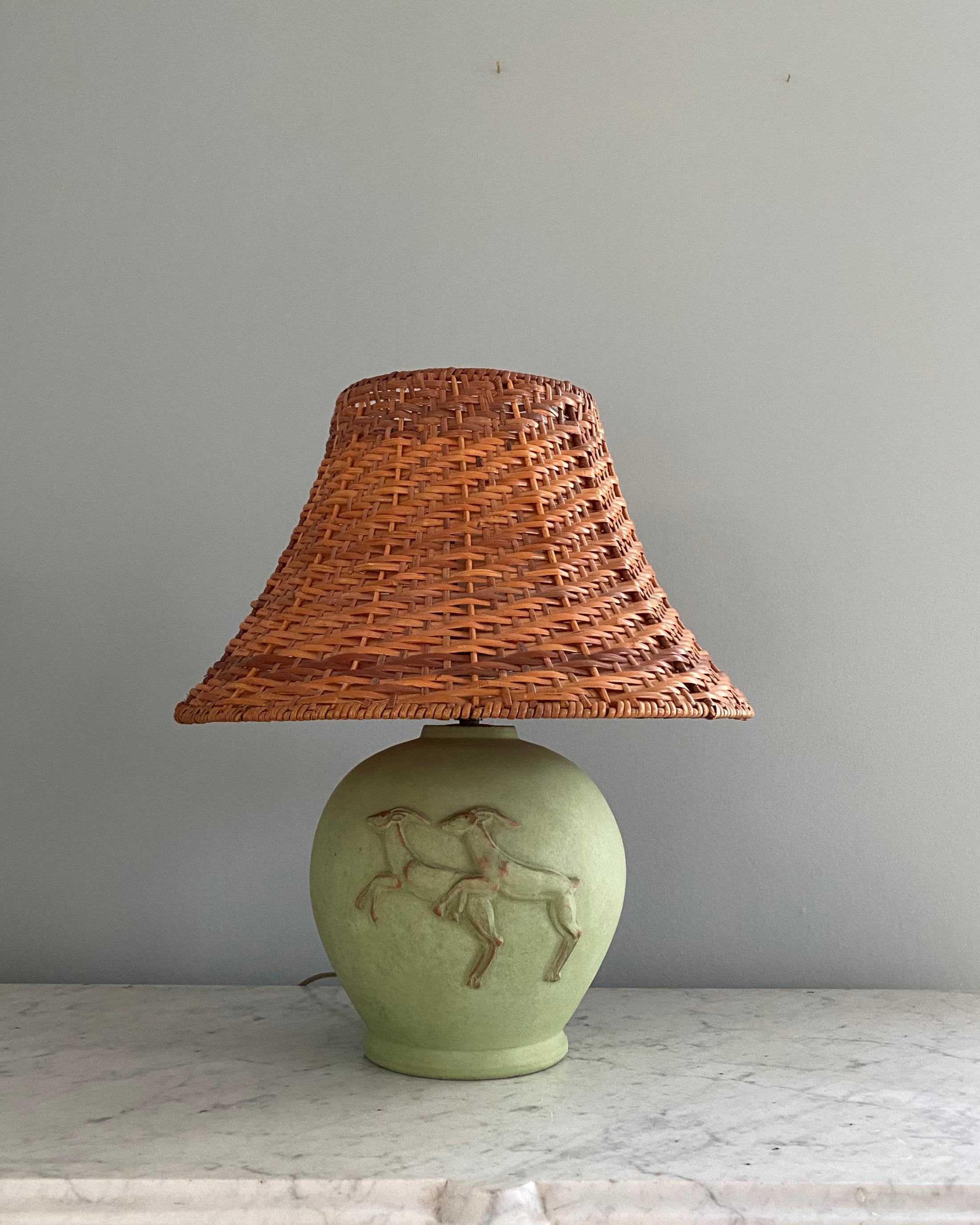 Vintage green table lamp with rattan shade