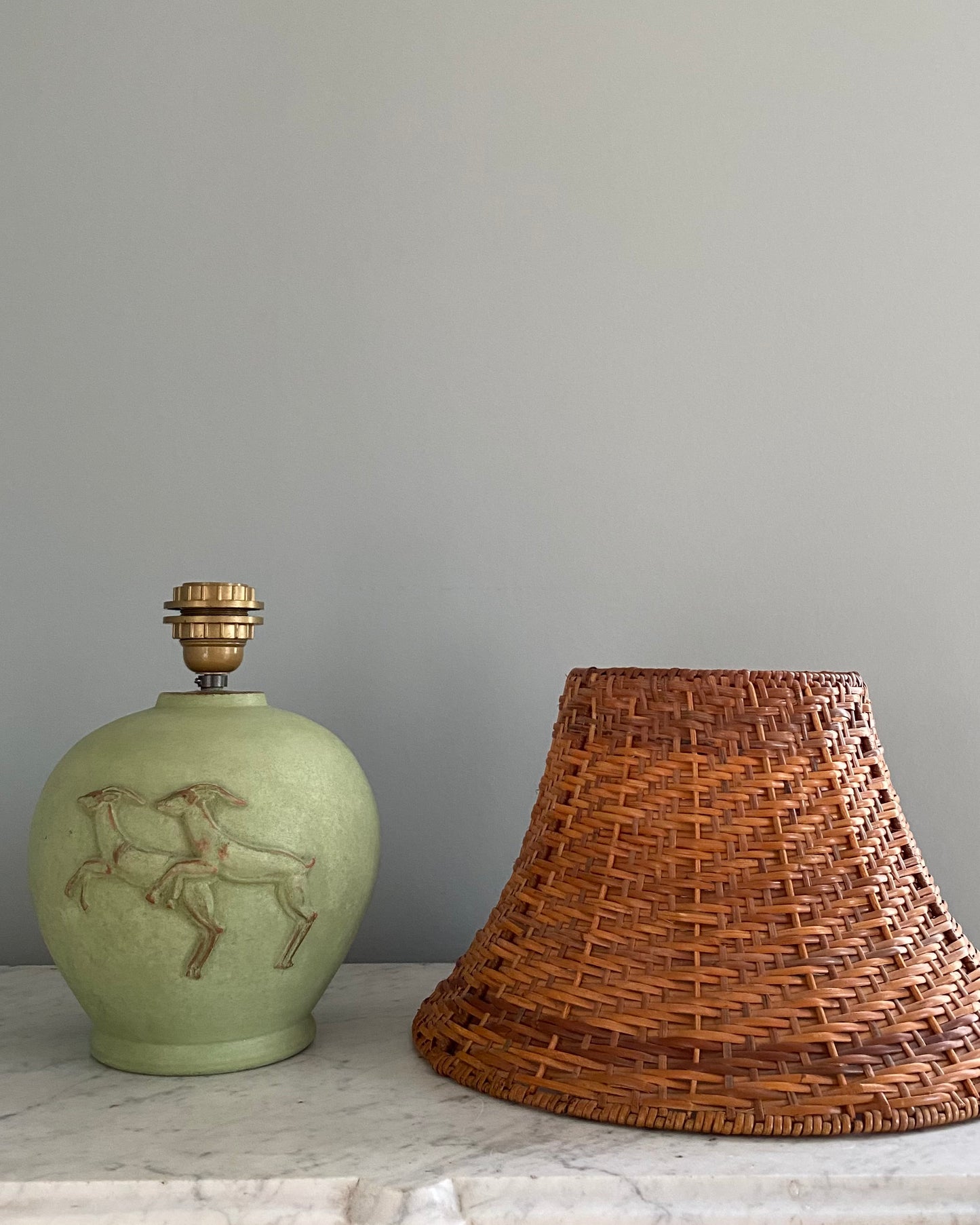 Vintage green table lamp with rattan shade