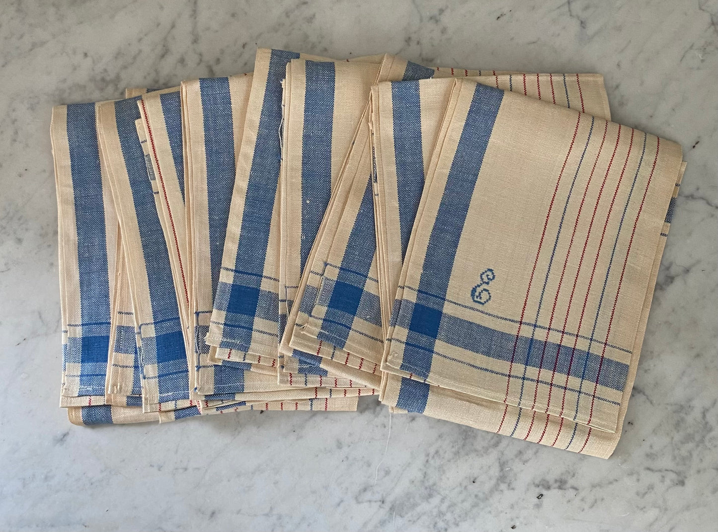 Set of ten vintage tea towels