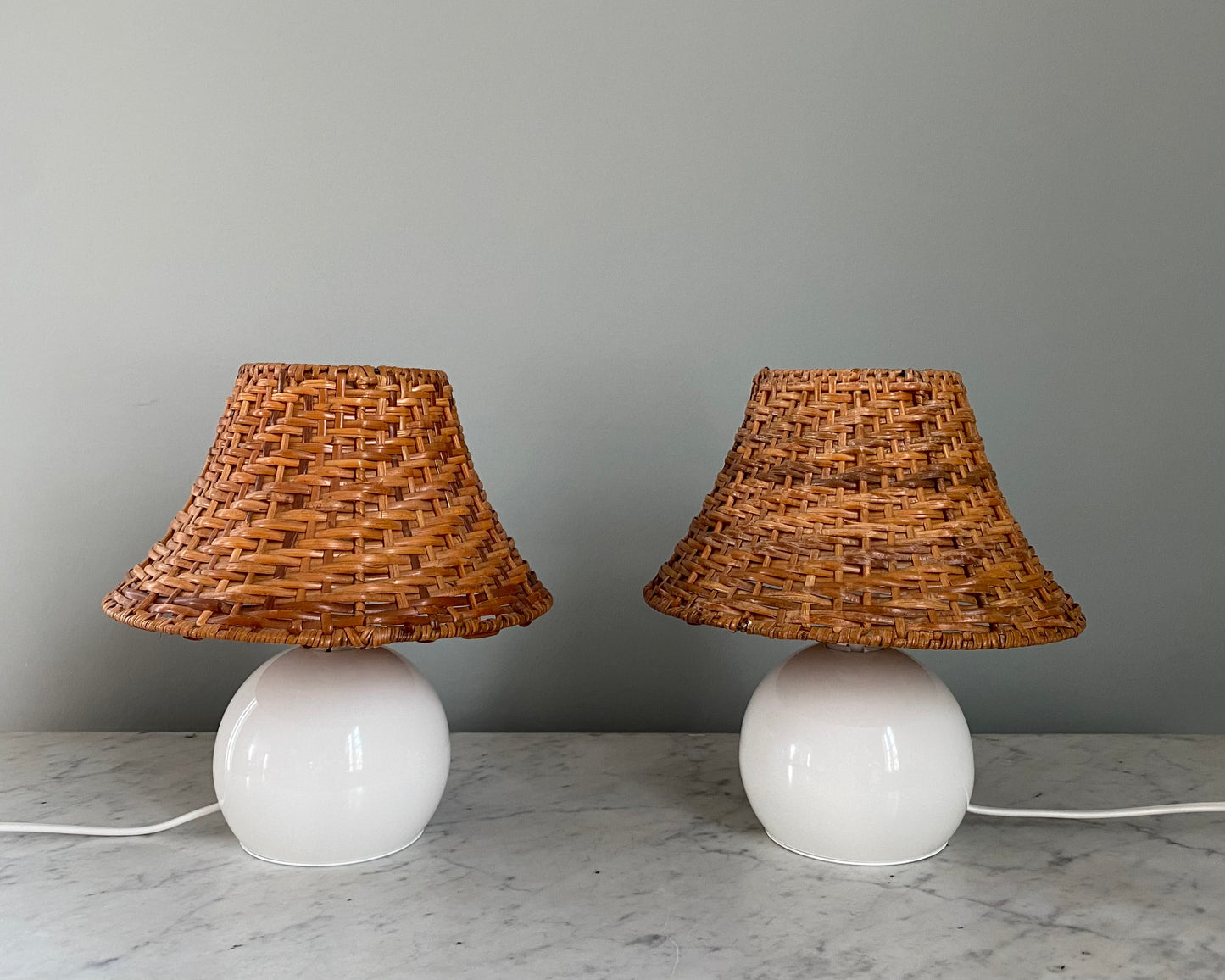 Pair of table lamps with rattan shades